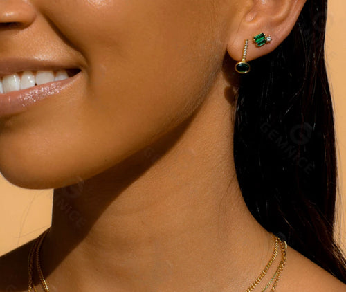 women wearing Baguette Emerald Stud Earrings